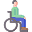 person in a wheelchair.