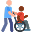 person in a wheelchair being pushed by carer.
