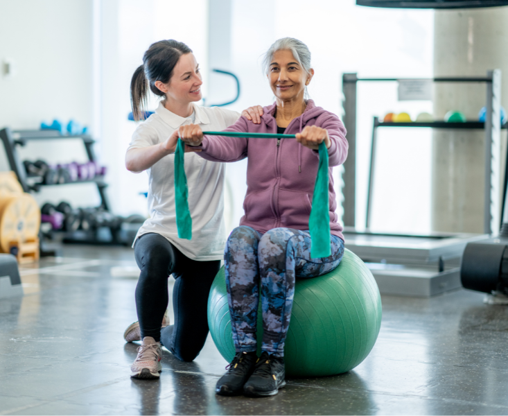 Woman exercising with resistance band